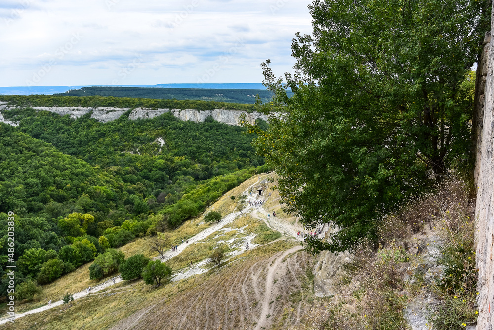 Buildings, buildings and caves of the city of Chufut-Kale, a medieval cave settlement in the Crimea. Cave city. Buildings, buildings and caves of the city of Chufut-Kale, a medieval cave settlement in the Crimea. Cave city.