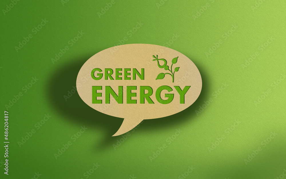 Green Energy Text on Recycled Craft Paper Againt Green Grass Background Green Energy Text on Recycled Craft Paper Againt Green Grass Background