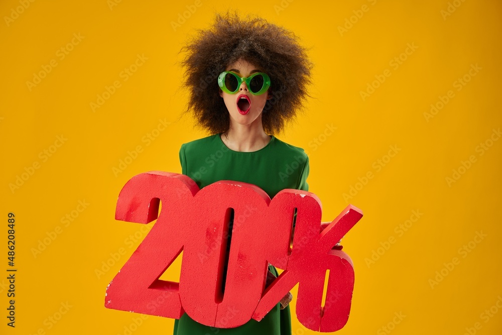 Beauty Fashion woman curly hairstyles green dress twenty percent discount studio model unaltered