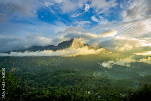 Beautiful mountain landscape with Sunrise and passing clouds. Munnar  Kerala  India