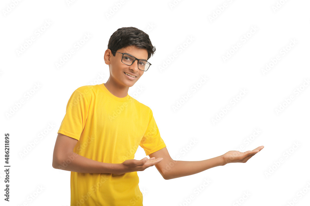 Indian child giving expression on white background. Indian child giving expression on white background.