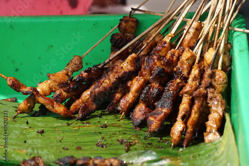 Sate (indonesian skewer) with a natural background. Sate is one of traditional Indonesian food which served with peanut sauce
