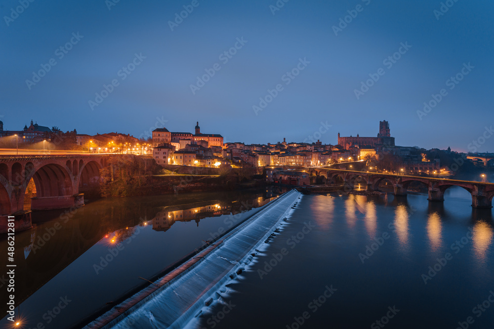 Albi city skyline, Tarn river and Albi Cathedral (Cathedral Basilica of Saint Cecilia) at dusk