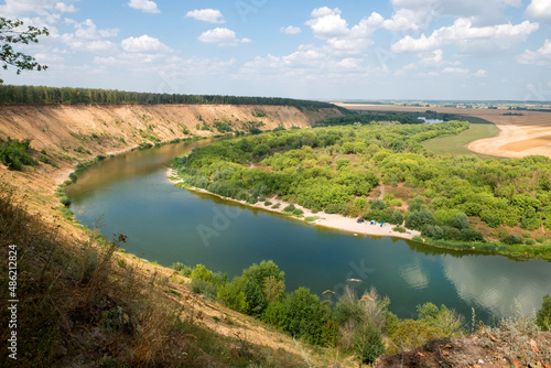 Panorama of the tract Krivoborye, Ramonsky district of the Voronezh region. Steep forested sandy slope of the Don River