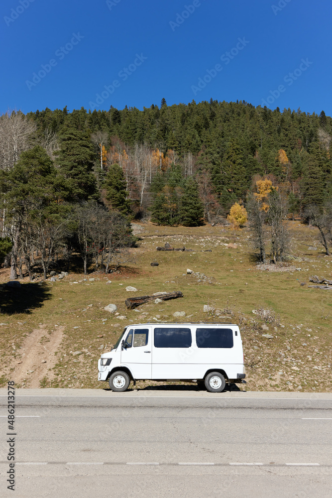 Fototapeta premium car on the background of the mountains trip vacation