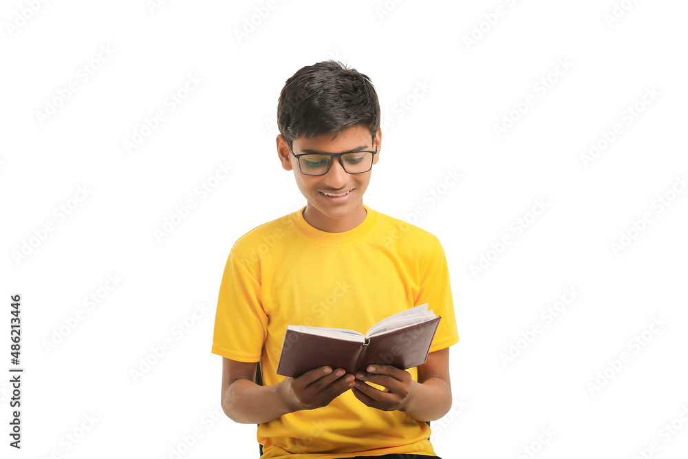 Indian boy with diary on white background. Indian boy with diary on white background.