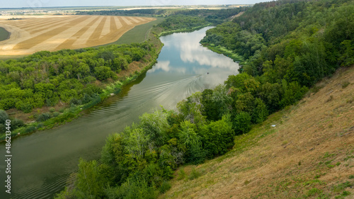 Fototapeta Naklejka Na Ścianę i Meble -  Panorama of the tract Krivoborye, Ramonsky district of the Voronezh region. Steep forested sandy slope of the Don River