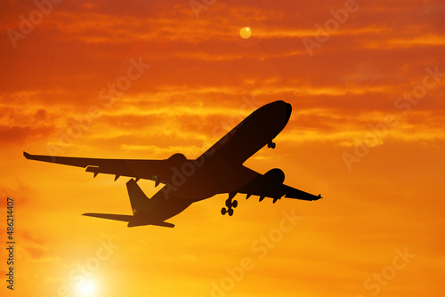 Silhouette of a passenger taking off at the airport. Tourism concept after the Covid-19 crisis