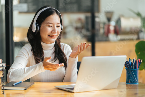 Beautiful woman wearing headsets worker call centre. working customer support service operator. communication in corporate, Business adviser concept.