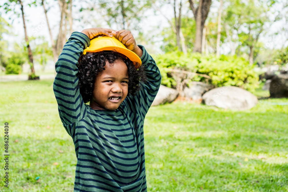 child little boy happy smile and laugh hair style afro relax in weekend holiday lifestyle park. child little boy happy smile and laugh hair style afro relax in weekend holiday lifestyle park.