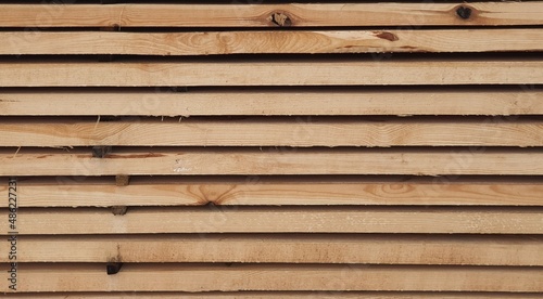 Wooden bars in rows and columns.