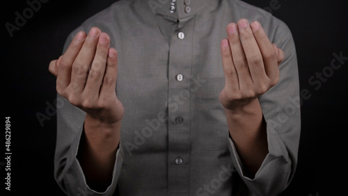 muslim prayer making dua with both hand separated