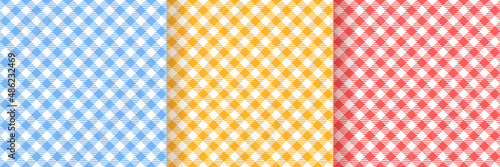 Tablecloth vichy seamless patterns. Checkered prints. Set of gingham backgrounds. Pastel retro textures. Tartan textile grid. Plaid picnic wallpaper. Flannel backdrop. Vector illustration.