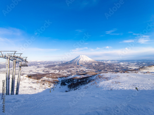 Snowy volcano viewed from a ski resort in late afternoon (Niseko, Hokkaido, Japan)