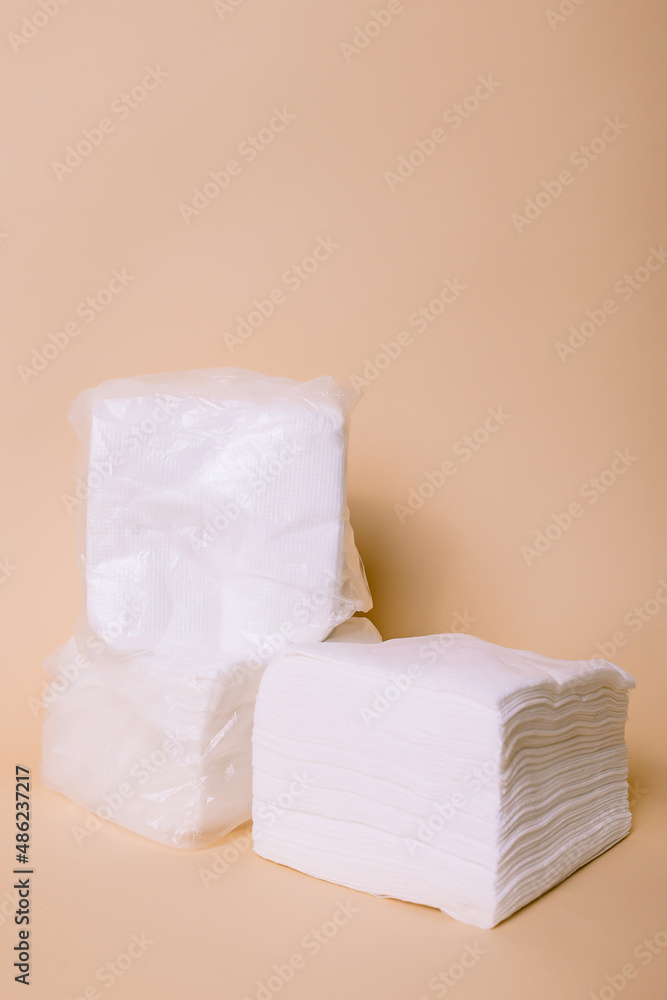 Eco friendly napkins on beige background Eco friendly napkins on beige background