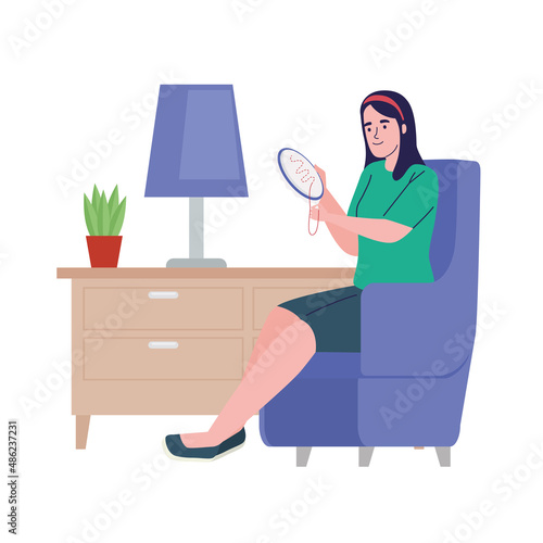 woman sitting embroidering