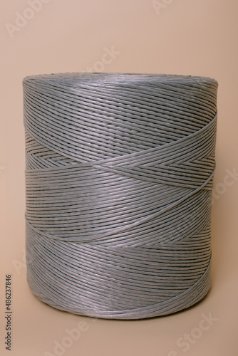 Thread on a beige background