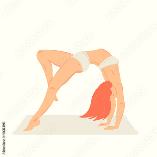 sport girl with red hair do fitness on the mat