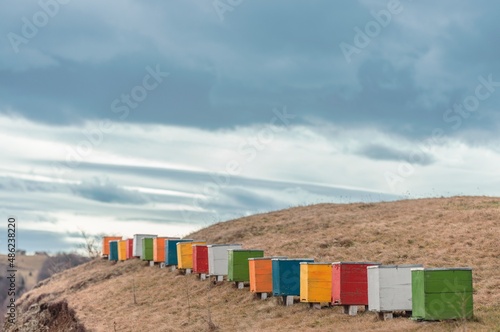 colorful beehives in a mountainous area with a special landscape