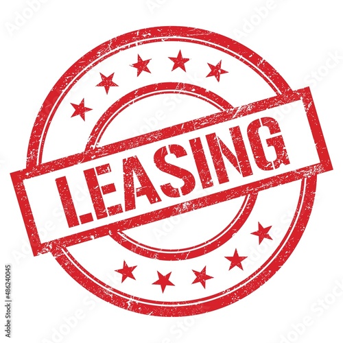 Fotografia LEASING text written on red vintage stamp.