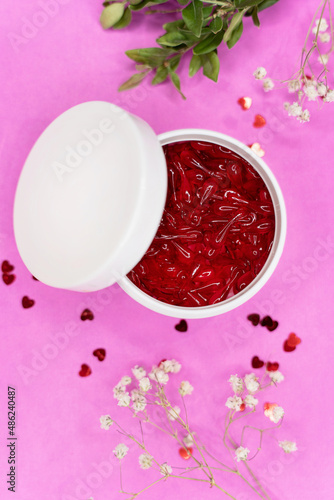 Women's cosmetics, white jar filled with vitamins