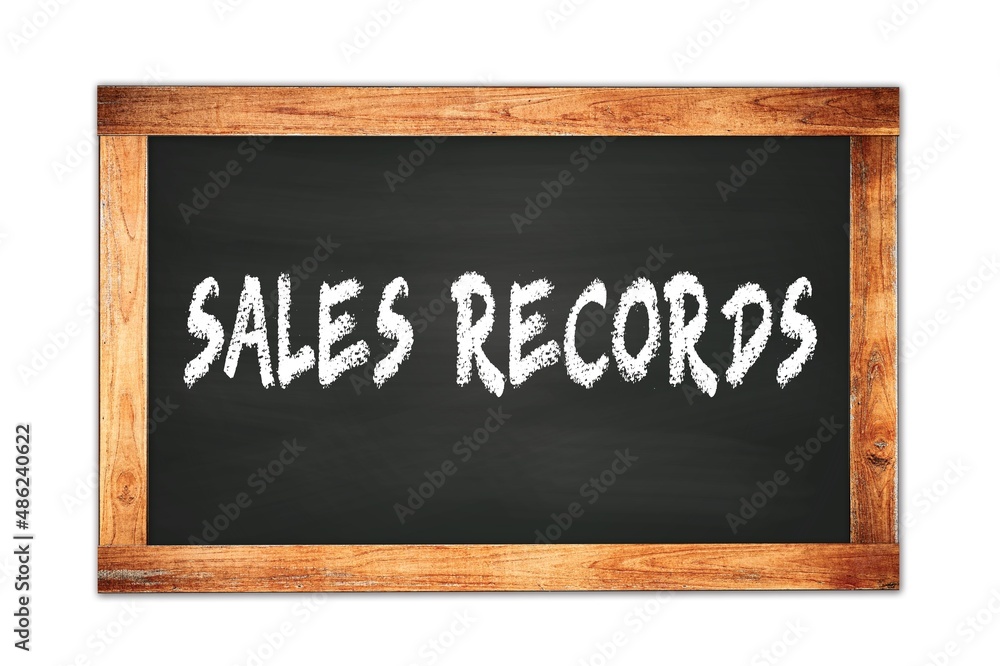 SALES RECORDS text written on wooden frame school blackboard. SALES RECORDS text written on wooden frame school blackboard.