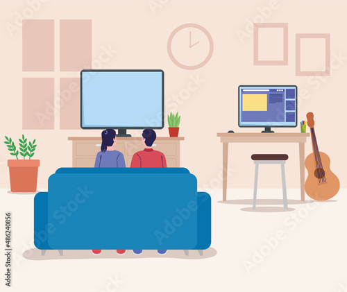 couple watching tv in living room