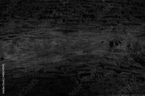 Black wood board texture background. Close-up.
