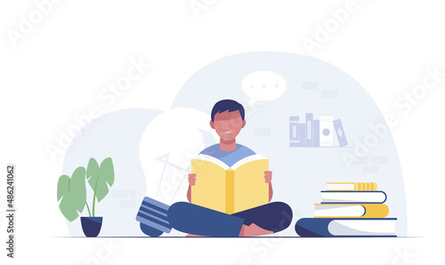 boy reading book while sitting learning and literacy day concept