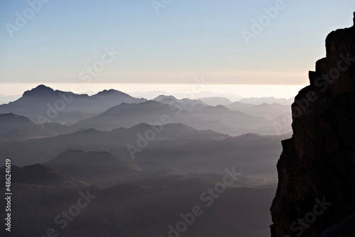 Mountain layers at sunrise on the top of Mousa Mountain in Egypt, South Sinai. Sinai mountains at sunset, Egypt