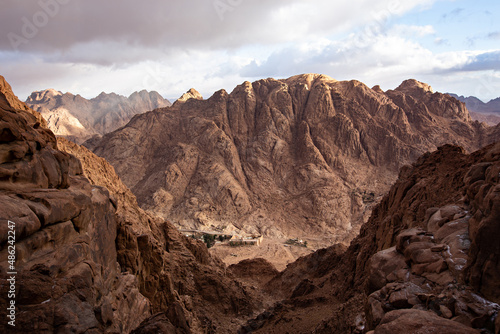 Sinai Mountains on cloudy day. Top view of Mousa mountain near St. Catherine Monastery, Egypt  photo