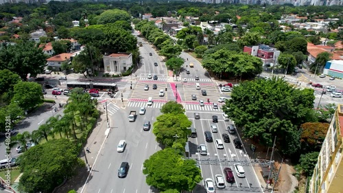 Famous crossing between Reboucas avenue and Brazil avenue at downtown Sao Paulo Brazil. Office towers buildings and vehicles traffic at famous avenues at downtown Sao Paulo Brazil. photo