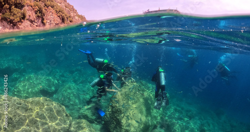 Tourists scuba dive Mediterranian Sea. Marmaris Turkey.