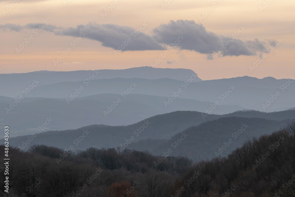 Fototapeta premium Mountain silhouettes at sunset