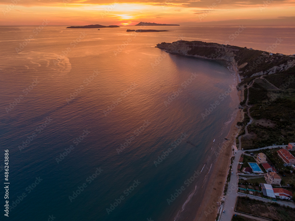 Spectacular Aerial drone view of sunset in arillas beach  in corfu greece