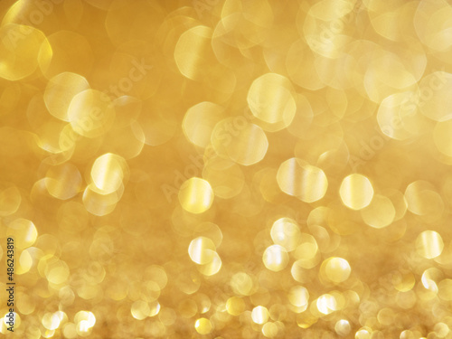 Sparkling golden powder. Festive background. © volff