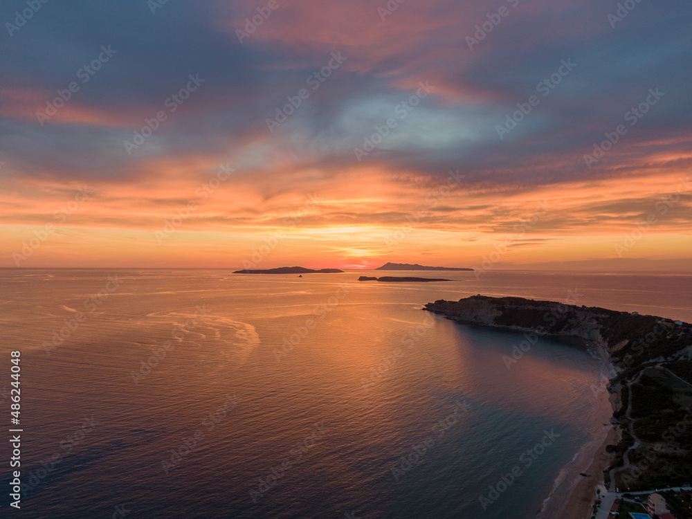 Spectacular Aerial drone view of sunset in arillas beach  in corfu greece