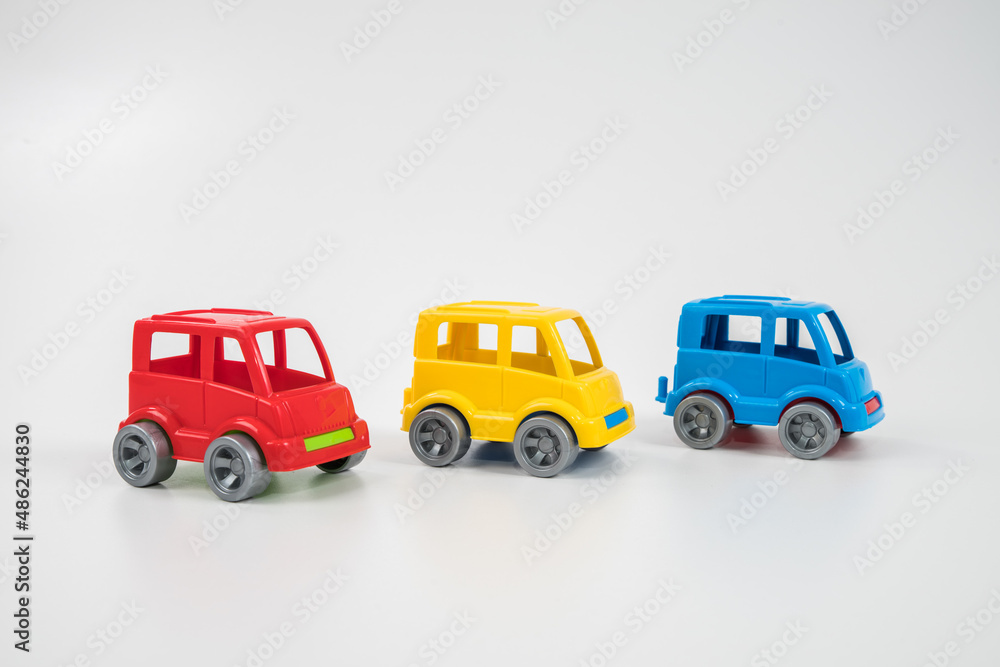 Multicolored plastic toy car. Buses. Equipment.