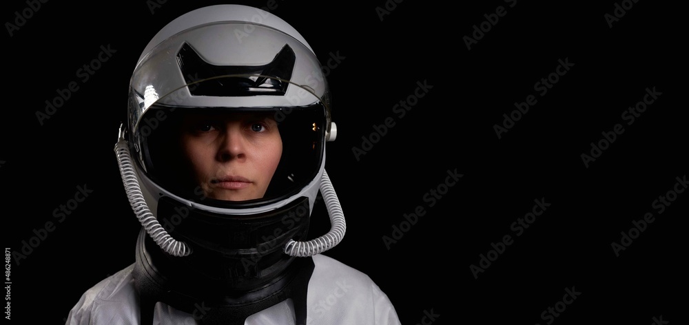 Female astronaut wearing a helmet