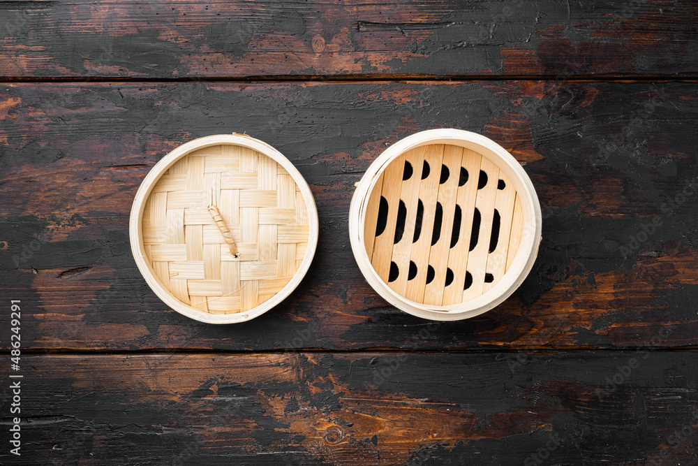 Empty Bamboo Steamer, with copy space for text or food, with copy space for text or food, top view flat lay , on old dark  wooden table background