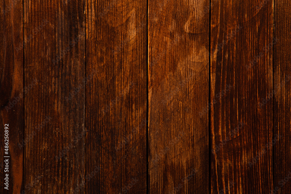 Fototapeta premium Painted wooden board for design or text. Colored wood abstraction.