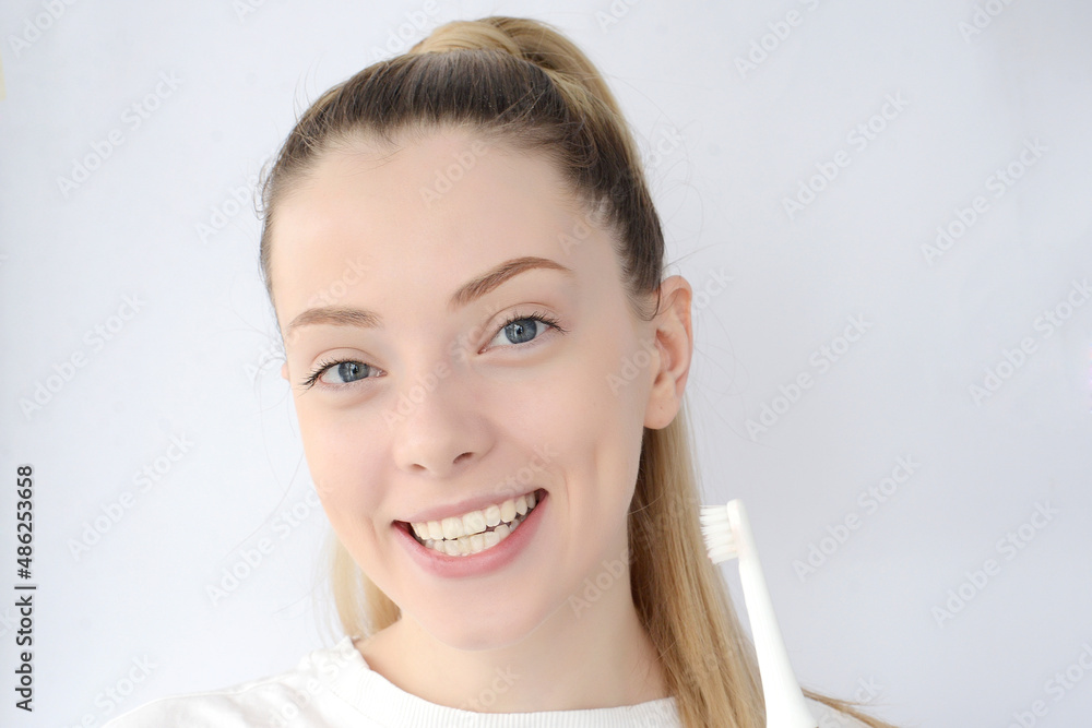 pretty woman brushing her teeth pretty woman brushing her teeth