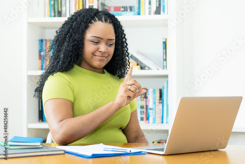 Video call of corpulent african american female student