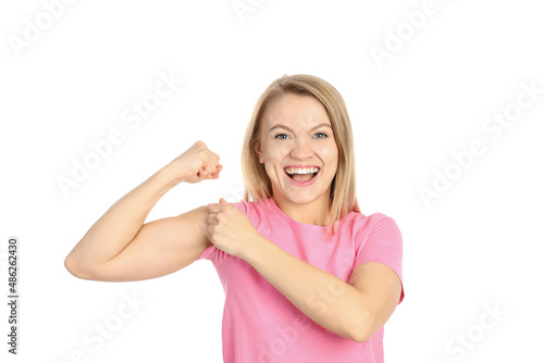 Wallpaper Mural Young woman showing biceps, isolated on white background Torontodigital.ca