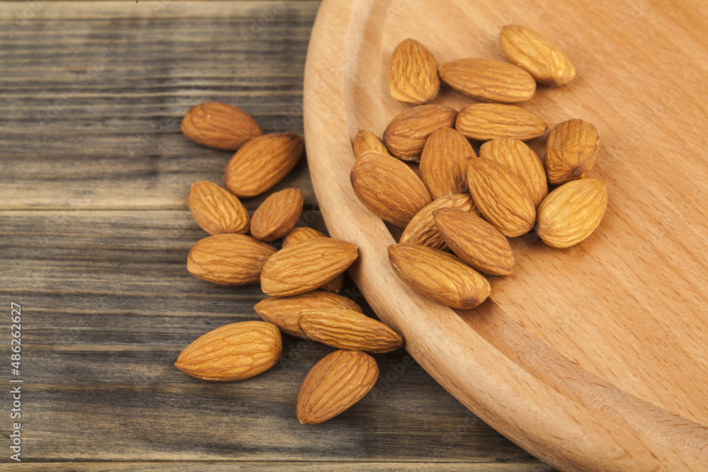 Pistachios on a wooden background. Pistachios on a wooden background.