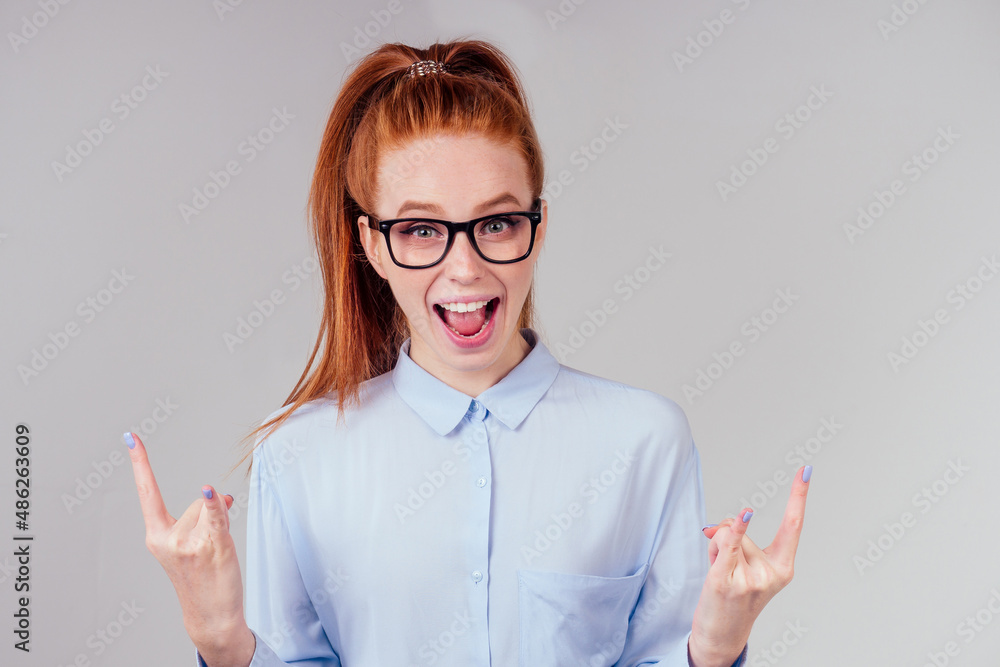 happy redhair ginger woman in studio background feeling heart thanks happy redhair ginger woman in studio background feeling heart thanks