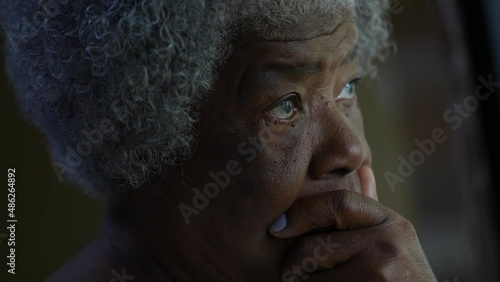 A worried black senior woman face a preoccupied African lady