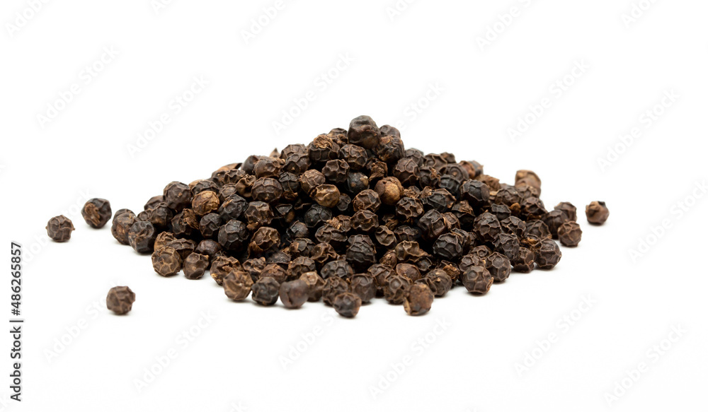 Black whole peppercorns peas close-up as a background. Spices of Cambodia. Seasoning for dishes. Additive ingredient for the preparation of delicious delicacies. Black whole peppercorns peas close-up as a background. Spices of Cambodia. Seasoning for dishes. Additive ingredient for the preparation of delicious delicacies.