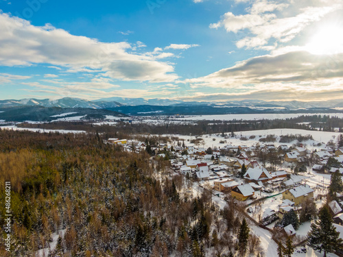 Aerial drone landscape view of Low Tatras mountains (Nizke Tatry). Winter cold weather, blue sky.