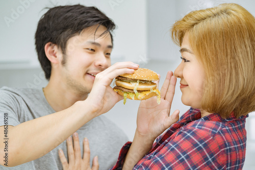 asian couples not eat fast food burger unhealthy  american calories fat meal Junk food .